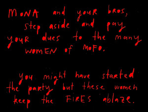 Red handwritten text on a black background with a strong message. It reads: MONA and your bros, step aside and pay your dues to the many women of MoFo. You might have started the party but these women keep the FIRES ablaze.